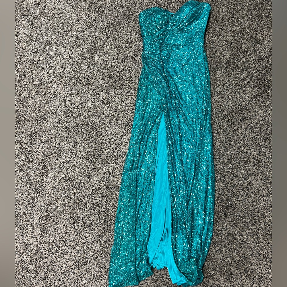 Floor length formal/promdress. Size small. Worn once. Has a slit